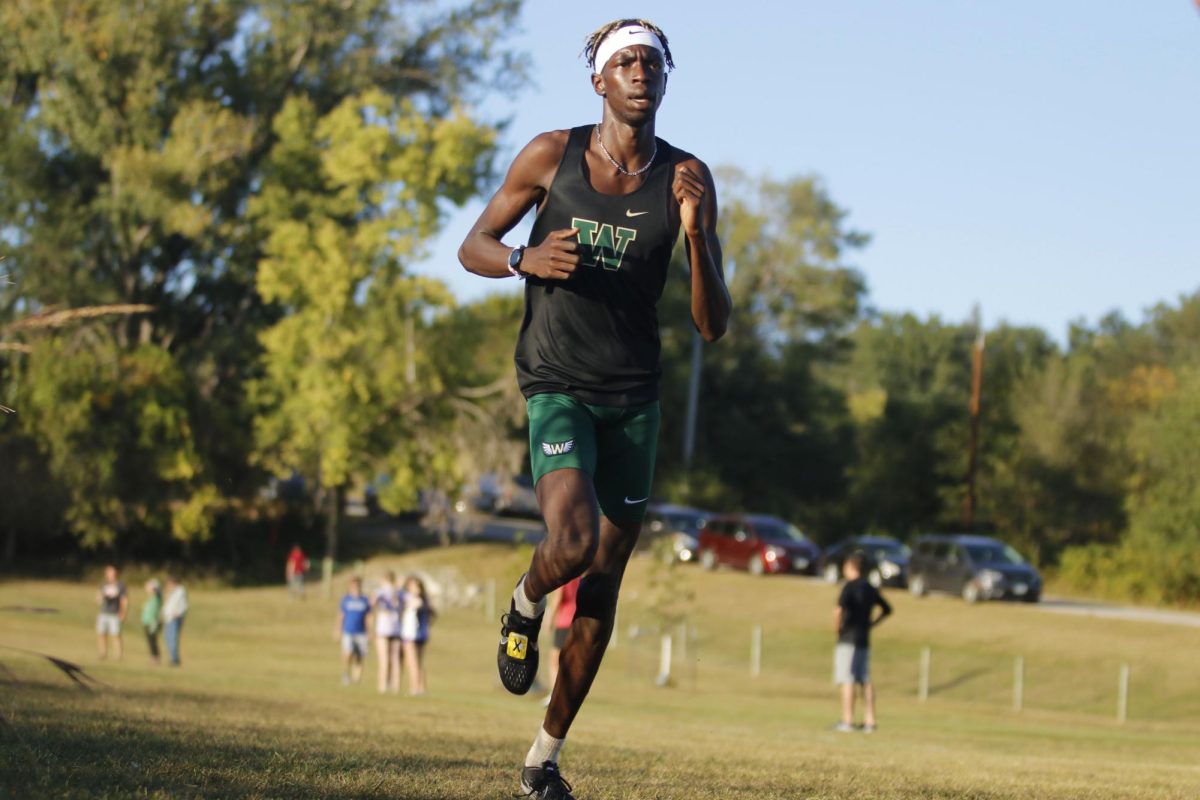 Moustafa Tiea '25 runs his third cross country race in the 2024 season for West High at Seminole Valley Cedar Rapids. 