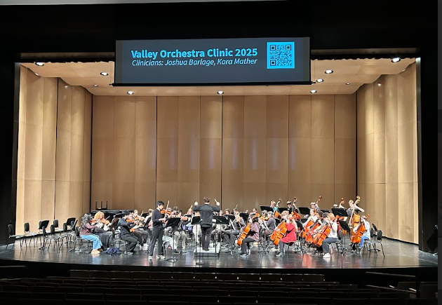 Violinist Nathan Chen '28 performs a solo with Philharmonic Strings at the orchestra festival Feb. 26.