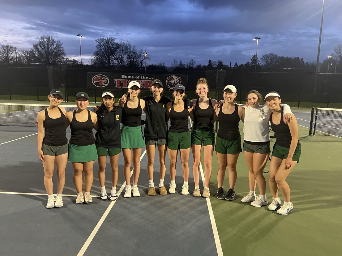 The girls tennis team smiles after competing against Cedar Falls for almost four hours. West ultimately won the meet 7-2. 

Photo courtesy of Nina Marquardt