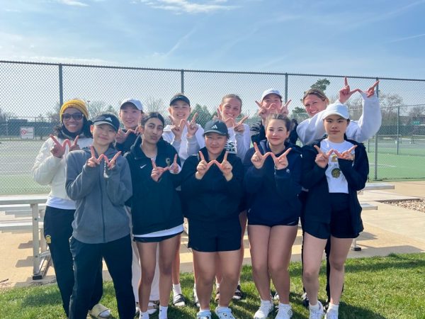 The West girls tennis teams celebrates their win against Cedar Rapids Jefferson at the Veterans Memorial Tennis Center April 12. 

Photo Courtesy of Amy Stier