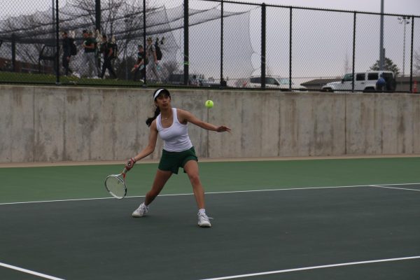 Sophie Singh '27 prepares to hit a forehand in her singles match against Prairie April 17. Singh won her match 6-1, 6-0.