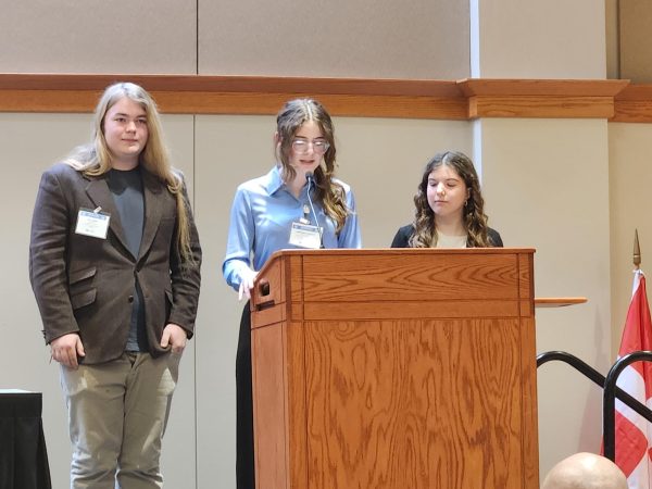 Josie Schwartz '25 speaks at the Model UN conference while representing the country of Georgia.
