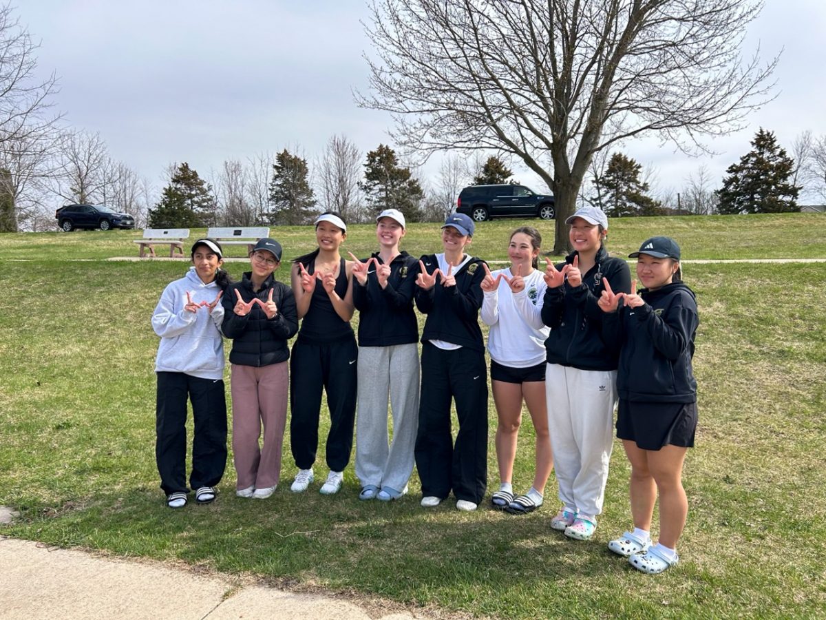 The West girls tennis team poses after defeating Western Dubuque 9-0. The team swept their last three meets 9-0. 

Photo Courtesy of Nina Marquardt