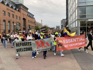 Protesters held signs and chanted in Spanish during their march across the Iowa City downtown area. Their chants included “La poli, la migra, la misma porqueria,” translating to “The police, ICE, the same beast.”