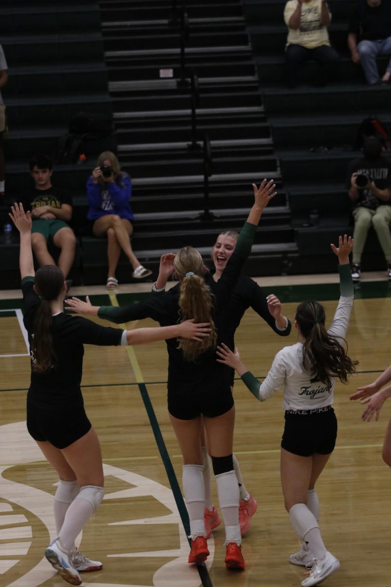 The team celebrates after winning the game.
