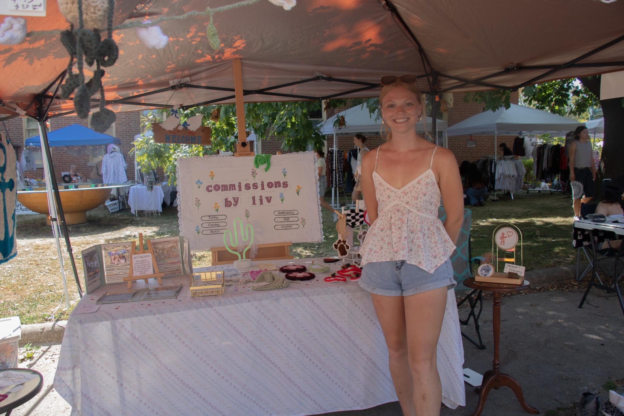 Liv Allen sells handmade crochet, embroidery, rugs and paintings at her booth in the flea market. 