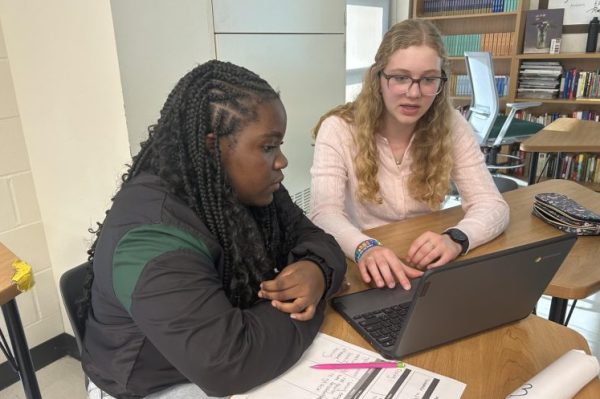 During Best of West, Lydia Cruce '27 tutors a fellow student. 