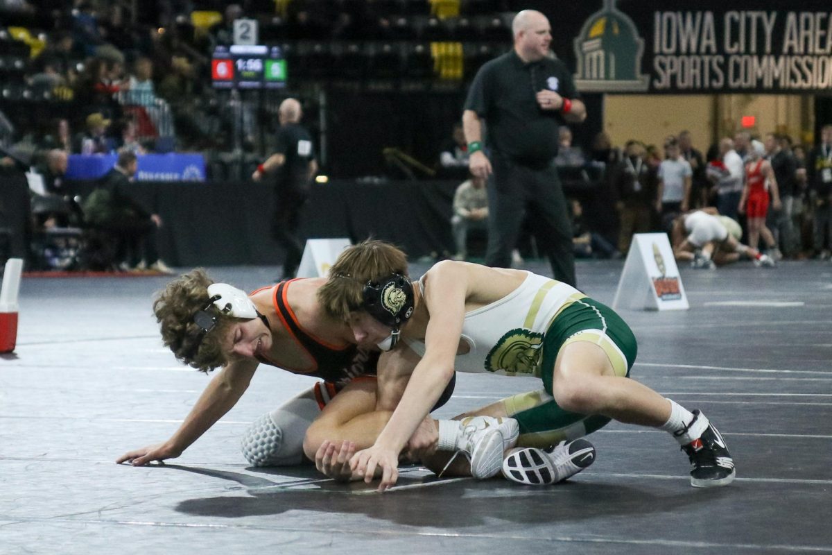 Hugo Hughes '29 looks for control of his opponent Dec. 6.