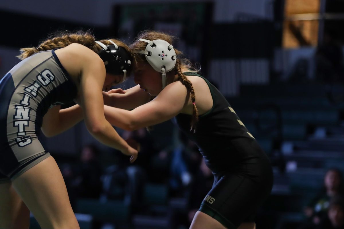 After recovering from an injury, Ayla Bleil '28 wrestles her match against Ava Cless of Xavier High School. She wrestled a high-scoring match, but lost by fall in three minutes and 12 seconds.