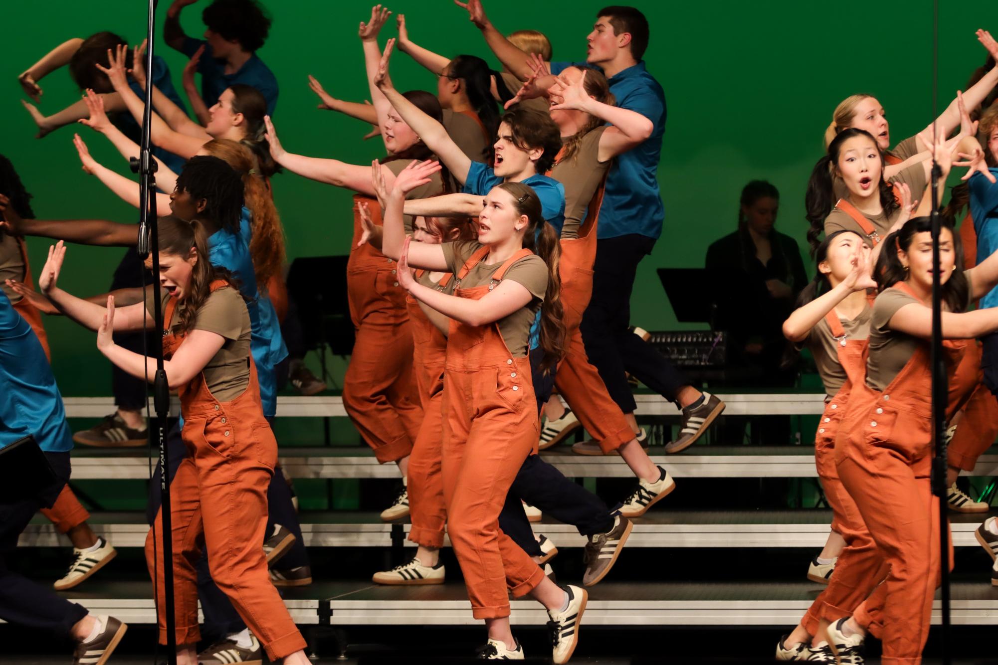 Members of Good Time Company dance in groups during their Minecraft-themed set at Choirs for a Cause Jan. 7.
