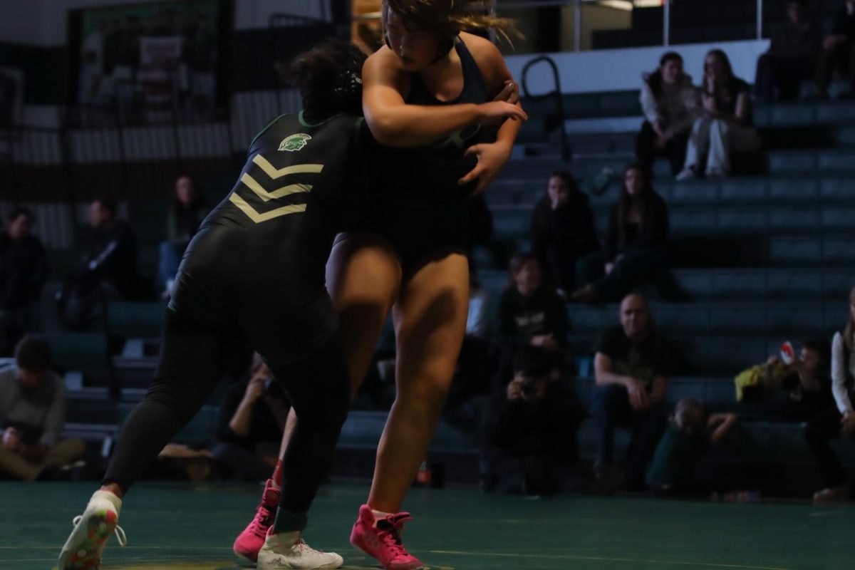 Stepping up from the junior varsity lineup, Aya Adam '28 wrestles in the place of Eva Jara '28. Adam fought hard as the match went back and forth between her and her opponent. 