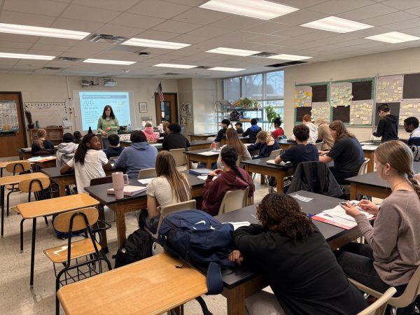 West High science teacher Sarah Long teaches her biology class.