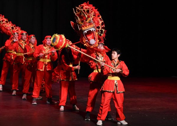 Tommy Gao '29 leads a dragon dance made up of 10 West High and Northwest Middle School students. Dragons appear differently in Western and Eastern cultures: European dragons are depicted as greedy, winged fire-breathers whereas Asian dragons are revered as deities and symbols of good fortune.