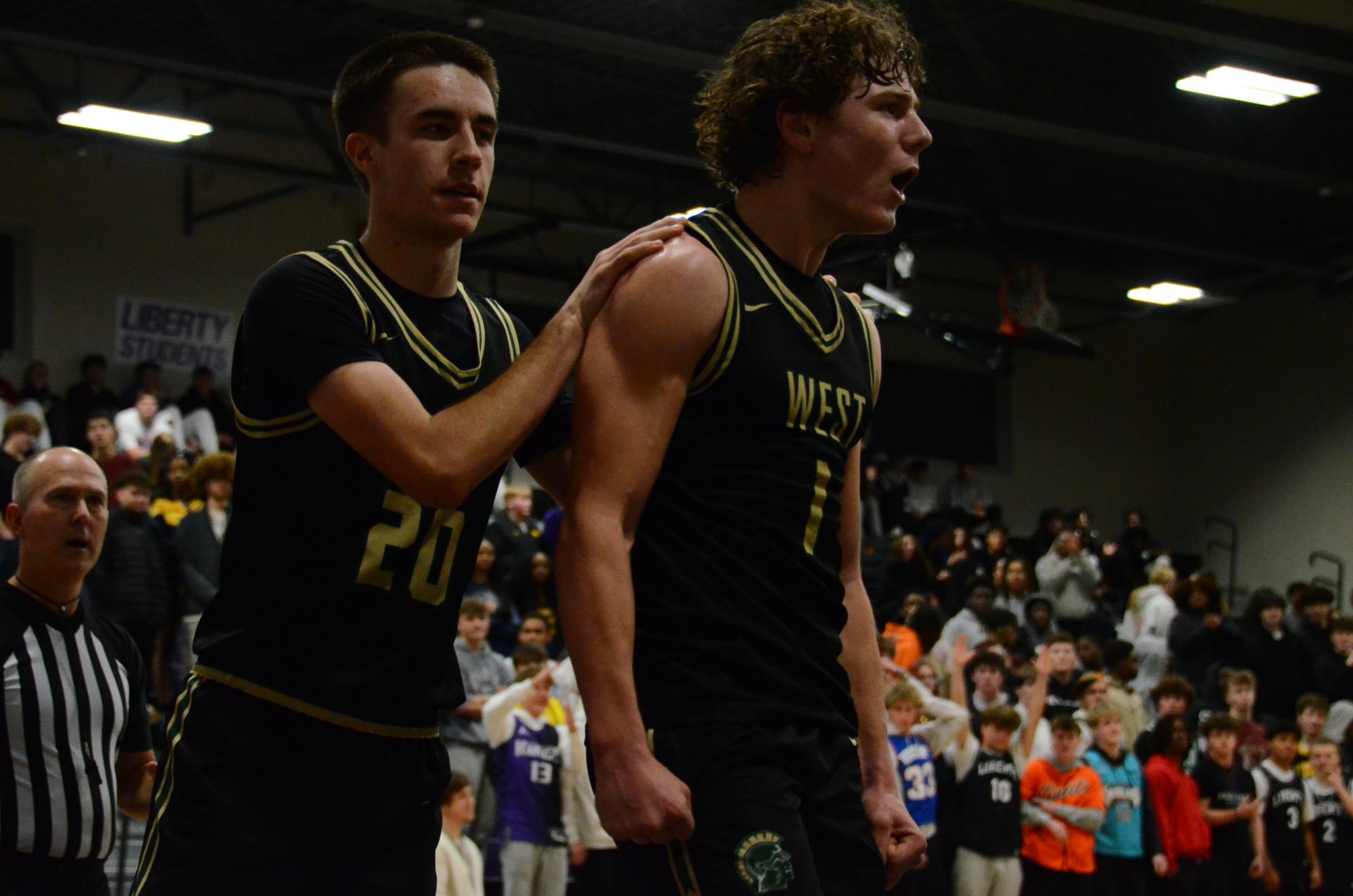 Ethan Headings '26 celebrates a big play in a game against Iowa City Liberty on Jan. 6. 