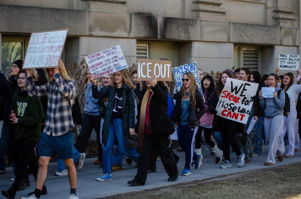 West High and City High students marched around the Pentacrest to protest ICE Feb. 5. Organized by senior Jack Overholt, the students walked out after C lunch and went downtown to march and speak.