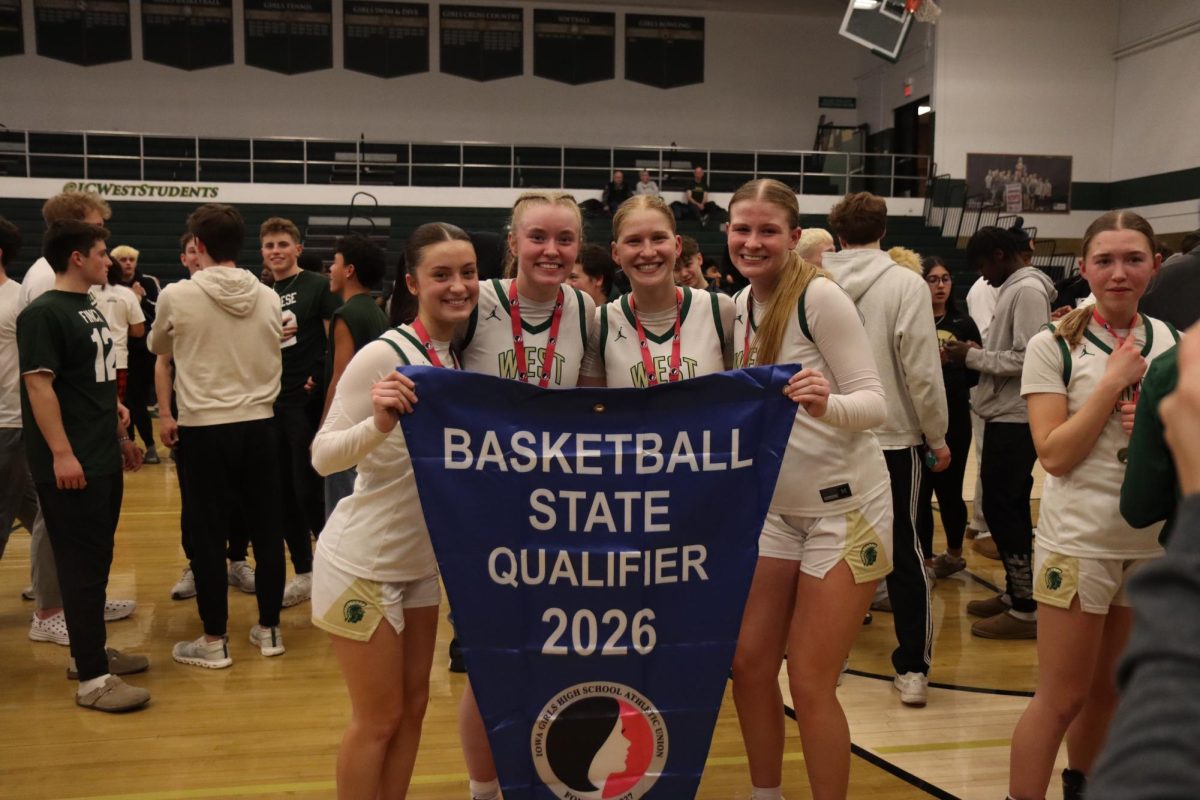 Team seniors Ava Frese, Grace Fincham, Kate Van Waning and Abby Neumiller pose __