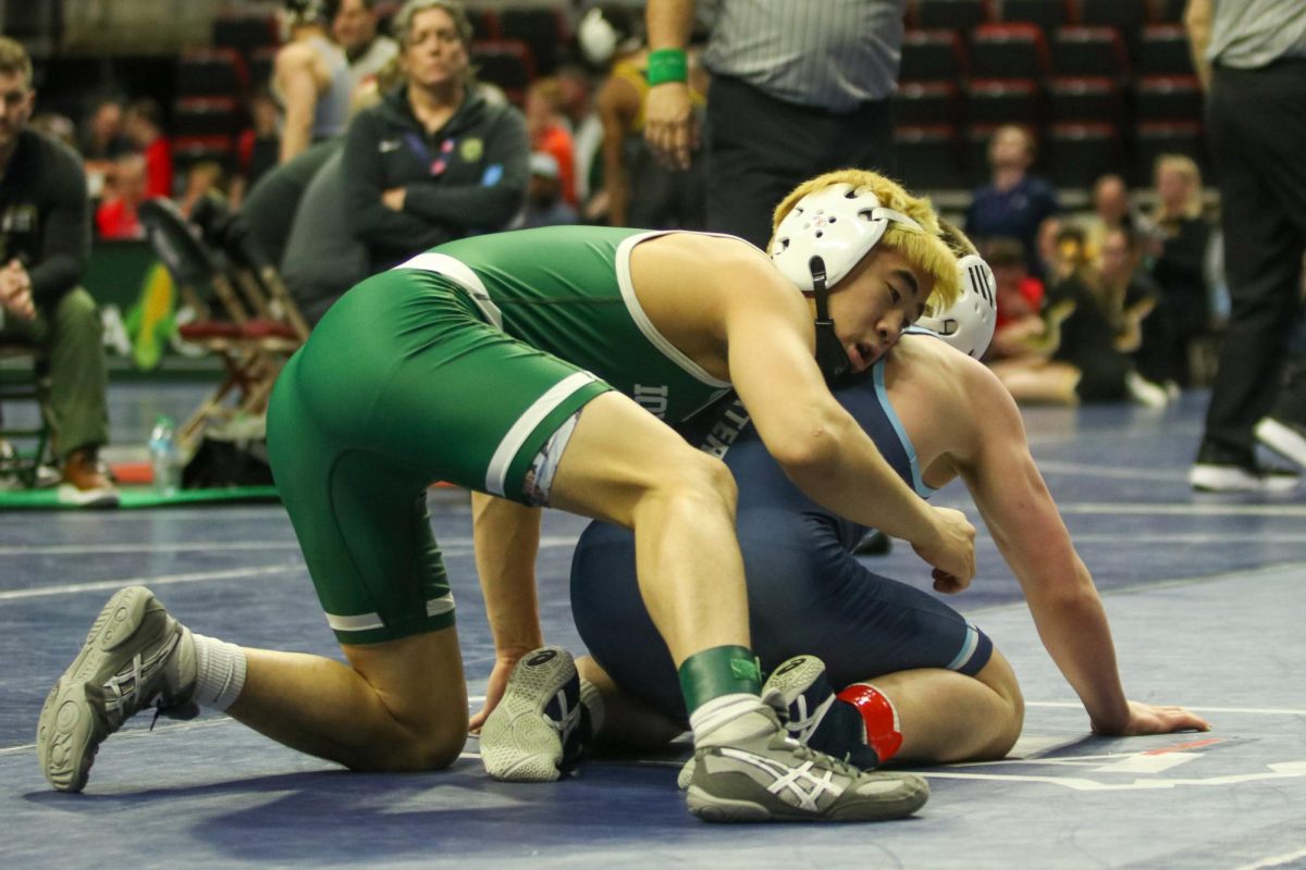 Senior Alexander Pierce anticipates the referee's whistle at the state tournament Feb. 20.