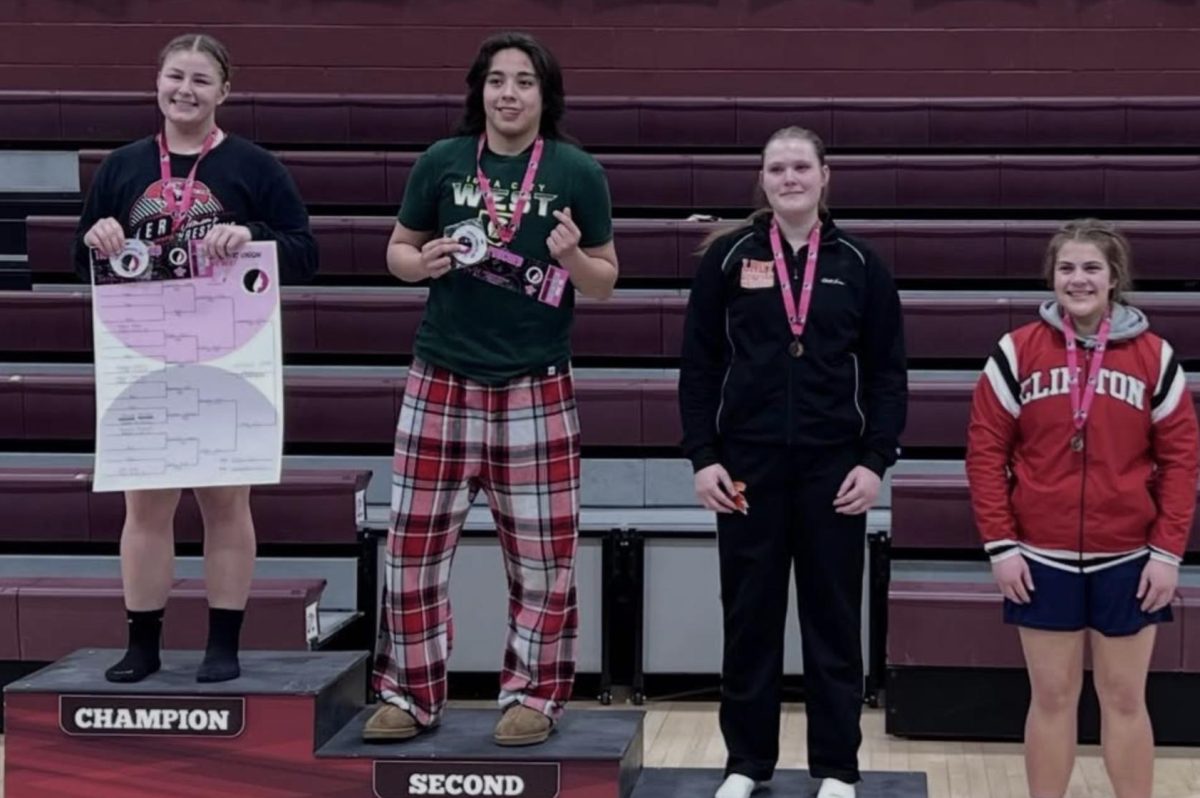 Eva Jara ‘27 stands on the second place podium after regional qualifiers date. @icw_girlswrestling