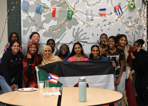 Students from differing schools and cultures gather together to support diversity in the West High cafeteria April 10.