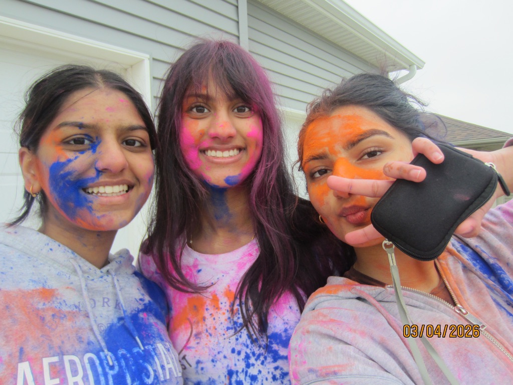 For Holi, it's traditional to celebrate with Holi powder or gulal like Aarushi Chauhan '28, Amy Thomas '28 and Bibisha Aryal '28.
