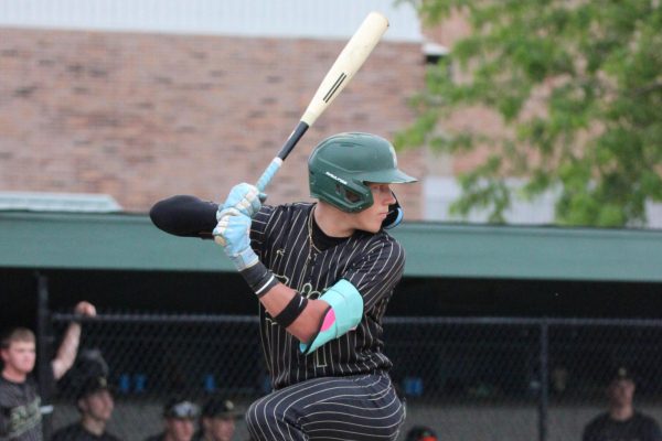 Eli Nolte ’26 swings at a pitch during game one of a doubleheader against Waterloo West May 18. Nolte led West High in hitting in game one, hitting two home runs. Photo courtesy of Leslie Kimura ’24.