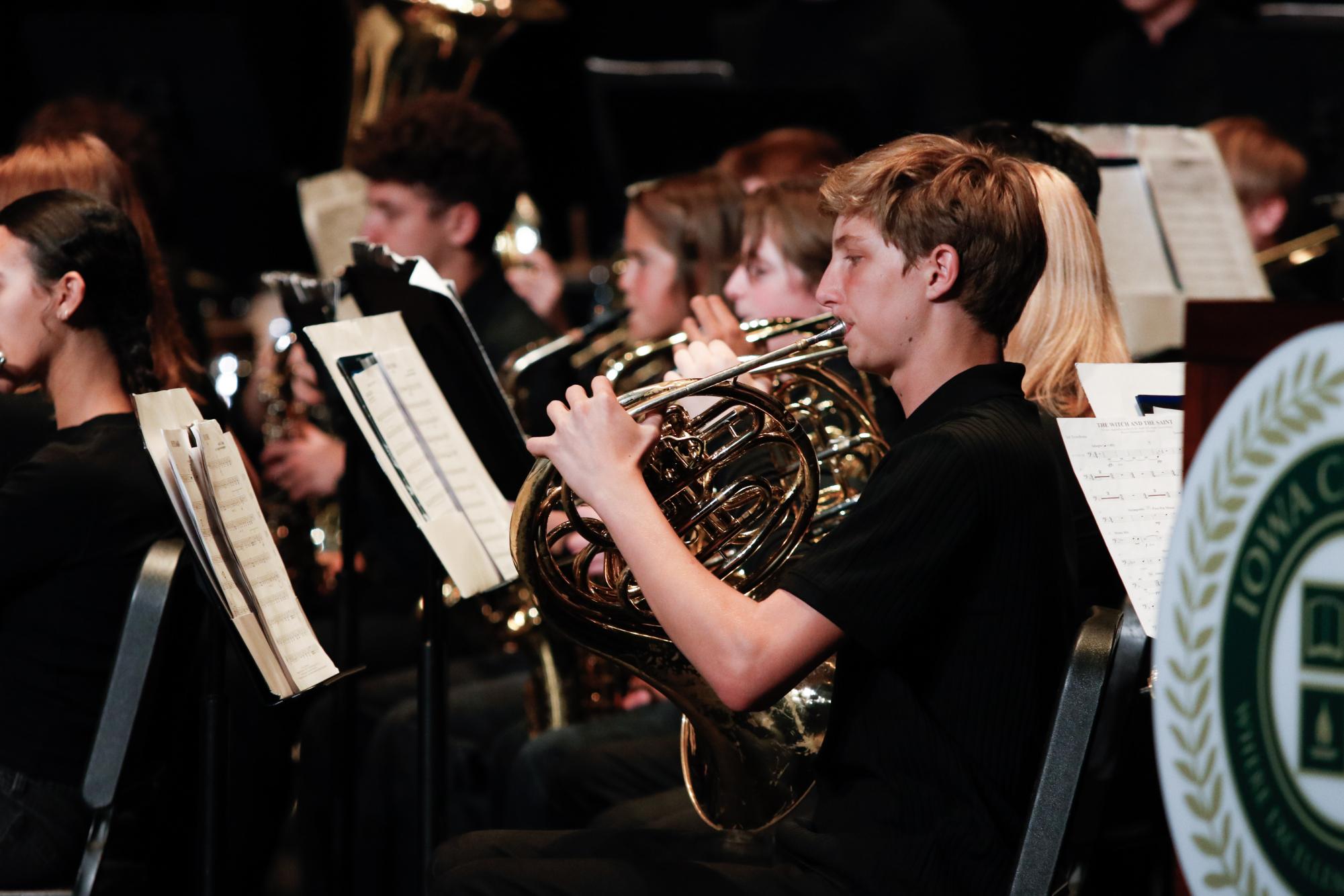 Blending with the band, French hornists in Freshman Band perform together. The group was the first to go May 21, playing before Varsity Band, Symphonic Band and Wind Ensemble.