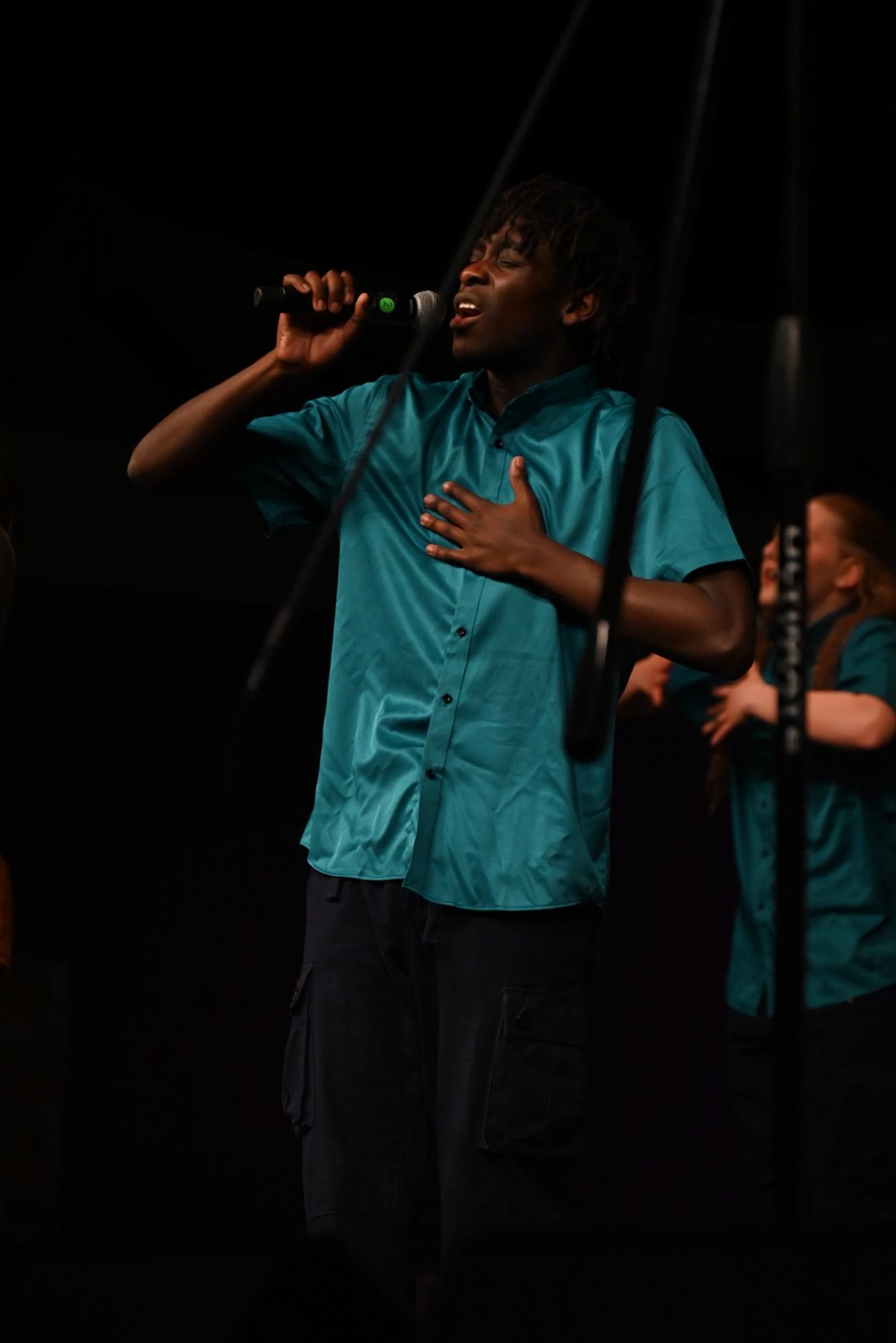 During West’s varsity show choir Good Time Company’s performance at Choirs for a Cause Jan. 7, Doresca sings his solo during “Thriller.”