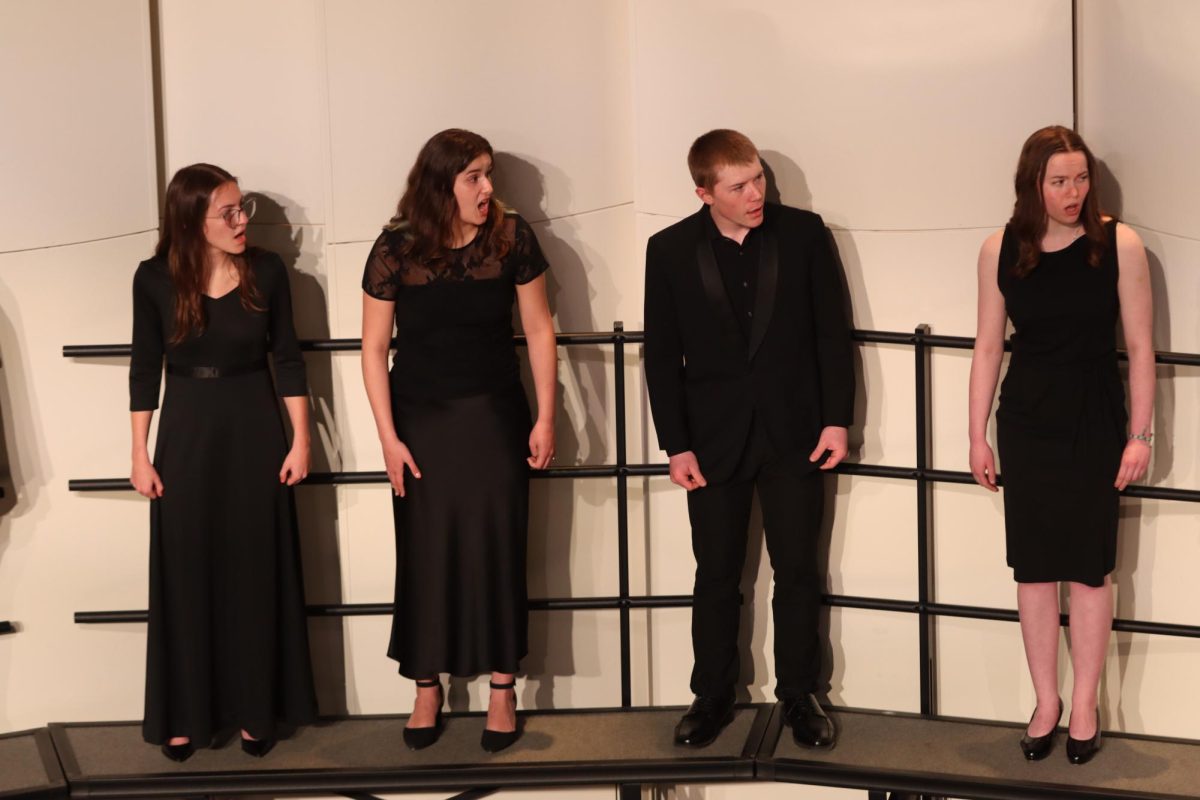 Ellie Roetlin '26, Eva Ortega Lopez '26, Gabriel Conrad '26 and Franny Jordan '26 sing with West Singers, West High's top choir. The group displayed four songs taken from earlier in the school year April 29.
