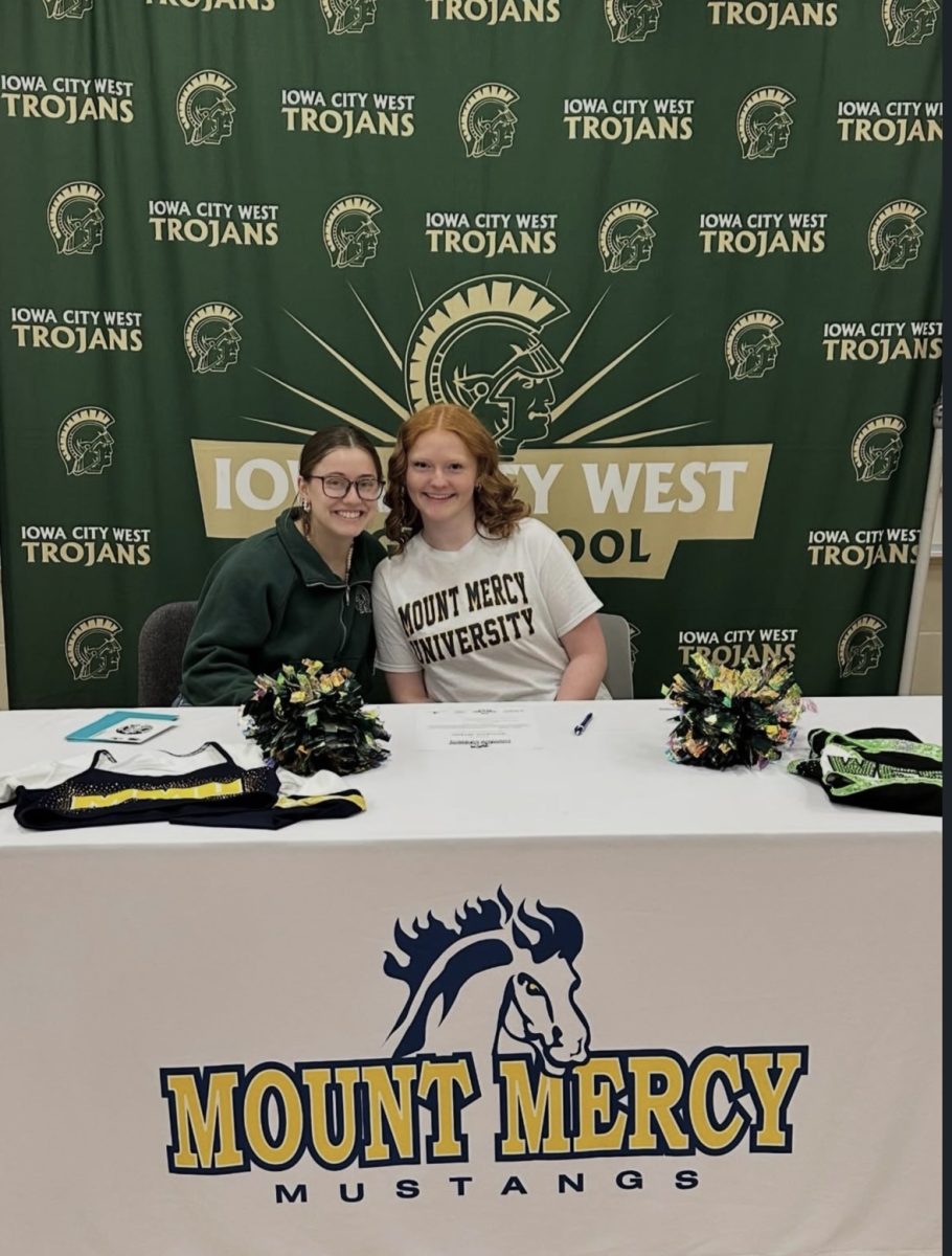 Hallei Praska '26 poses for a picture with her dance coach, Rachel Petersen, at signing day Dec. 19. Photo courtesy of Hallei Praska. 