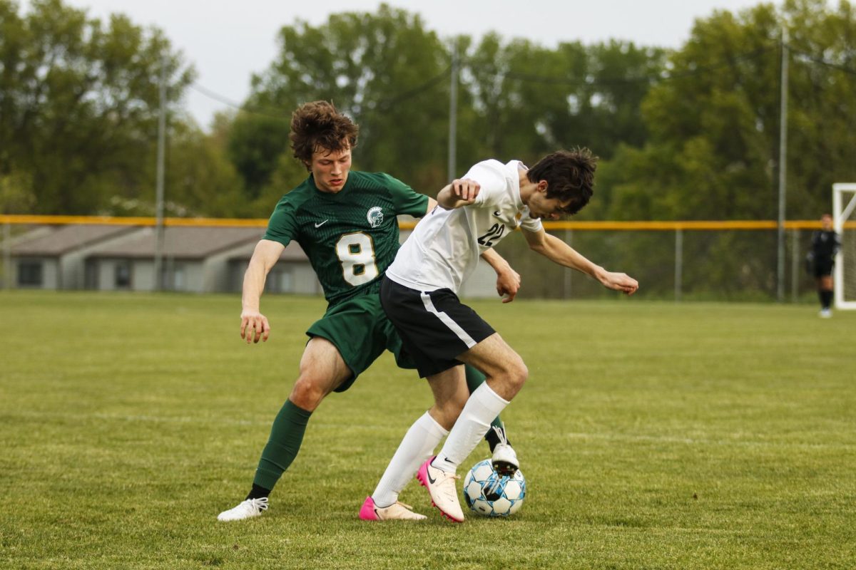 Venelin Kotev '26 steals the ball from a Southeast Polk attacker with a calculated tackle May 5.