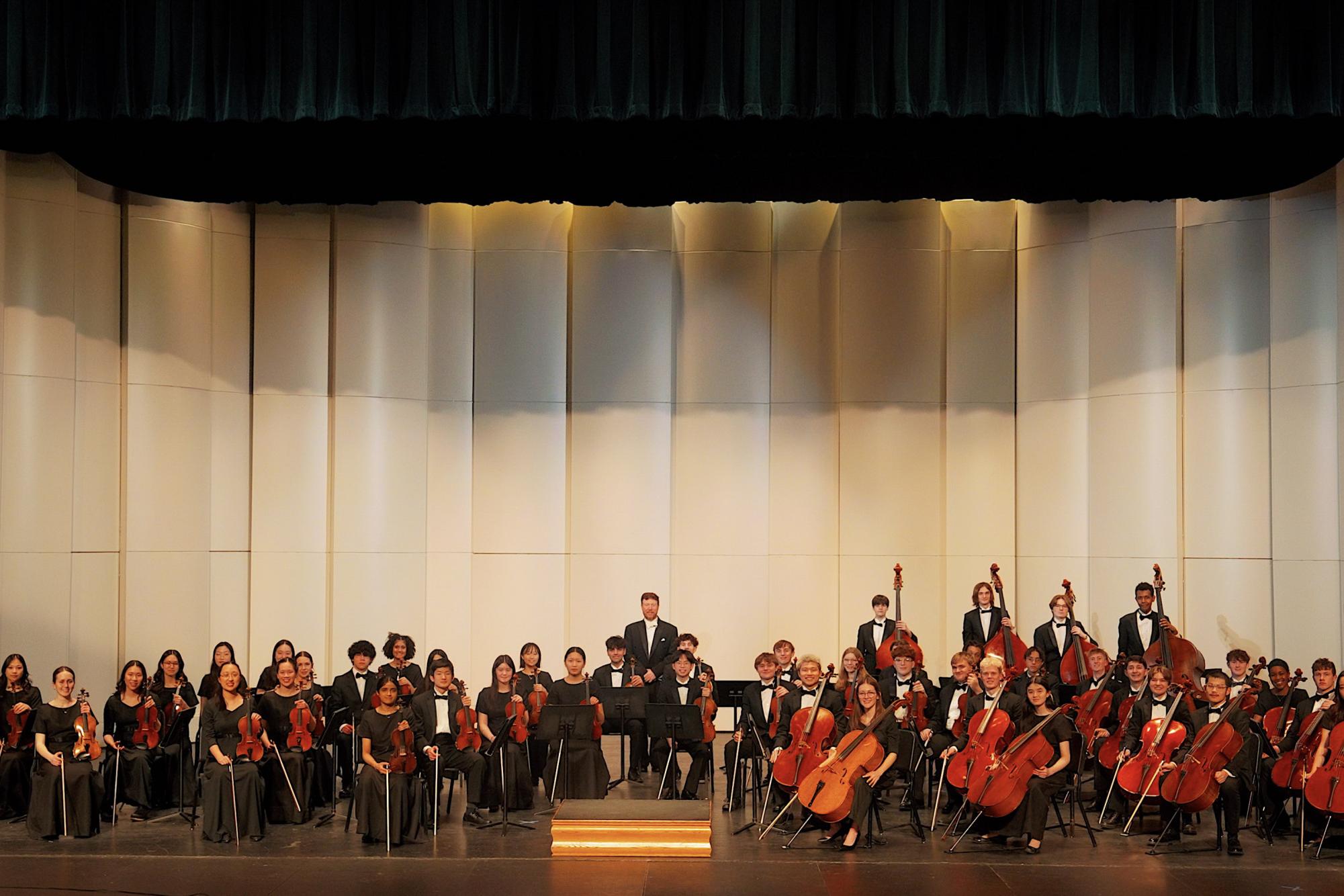 West High's Symphony Strings poses together after performing Feb. 26. The group will play at two prestigious events next year. Photo courtesy of Jon Welch.